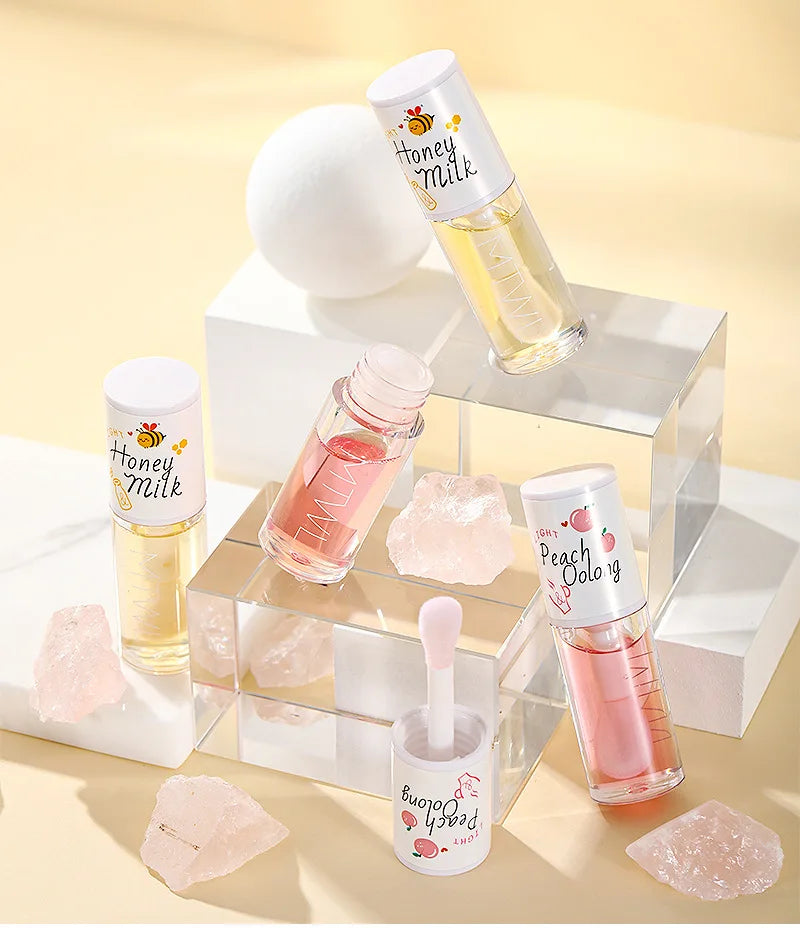 White Peach And Honey Lip Oil Soothes Dry Moisturizes And Does Not Fade Lovely Big Brush Head Lip Gloss